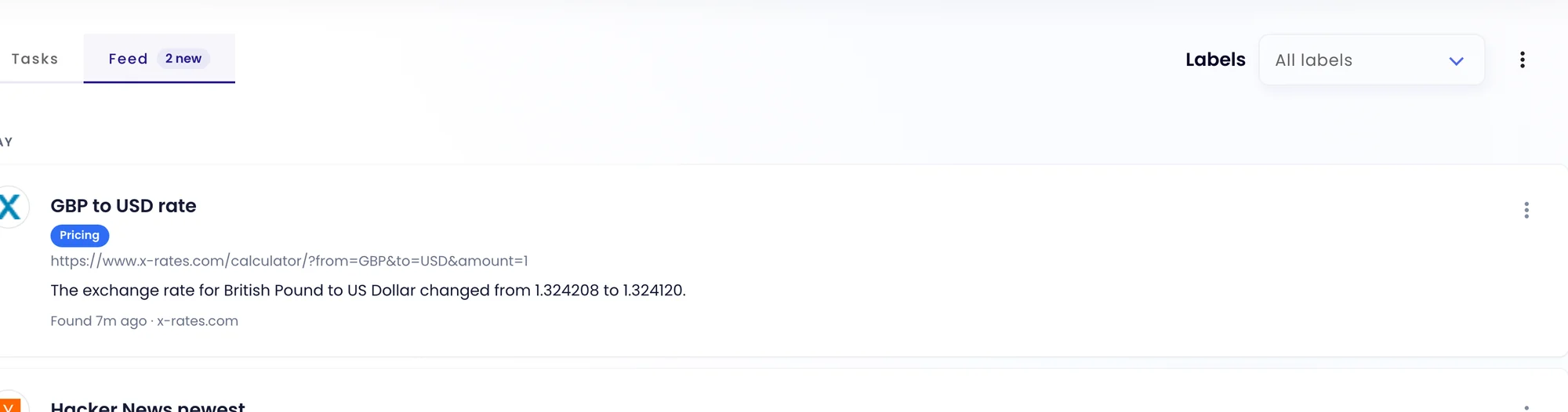 The Feed with two changes: an exchange rate that moved and new links on Hacker News